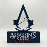 Placa Assassin's Creed Unity – Letreiro Gamer Mesa, Enfeite Setup, Revolução ⚔️⚜️