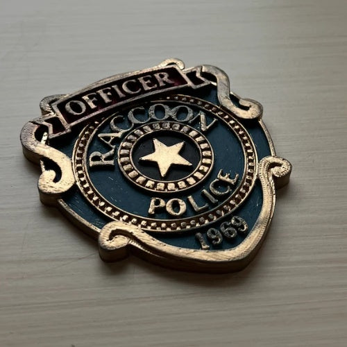 Distintivo Raccoon Police R.P.D. - leon kennedy re9 -  Resident Evil Colecionador 🔥💎🎬