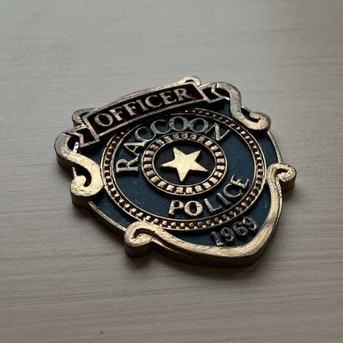 Distintivo Raccoon Police R.P.D. - leon kennedy re9 -  Resident Evil Colecionador 🔥💎🎬